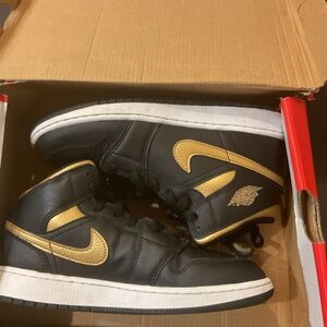 Nike Black and Gold Air Jordan 1 Sneakers